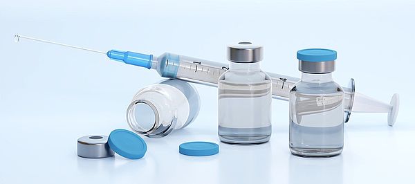 Spritze und Impfstoff